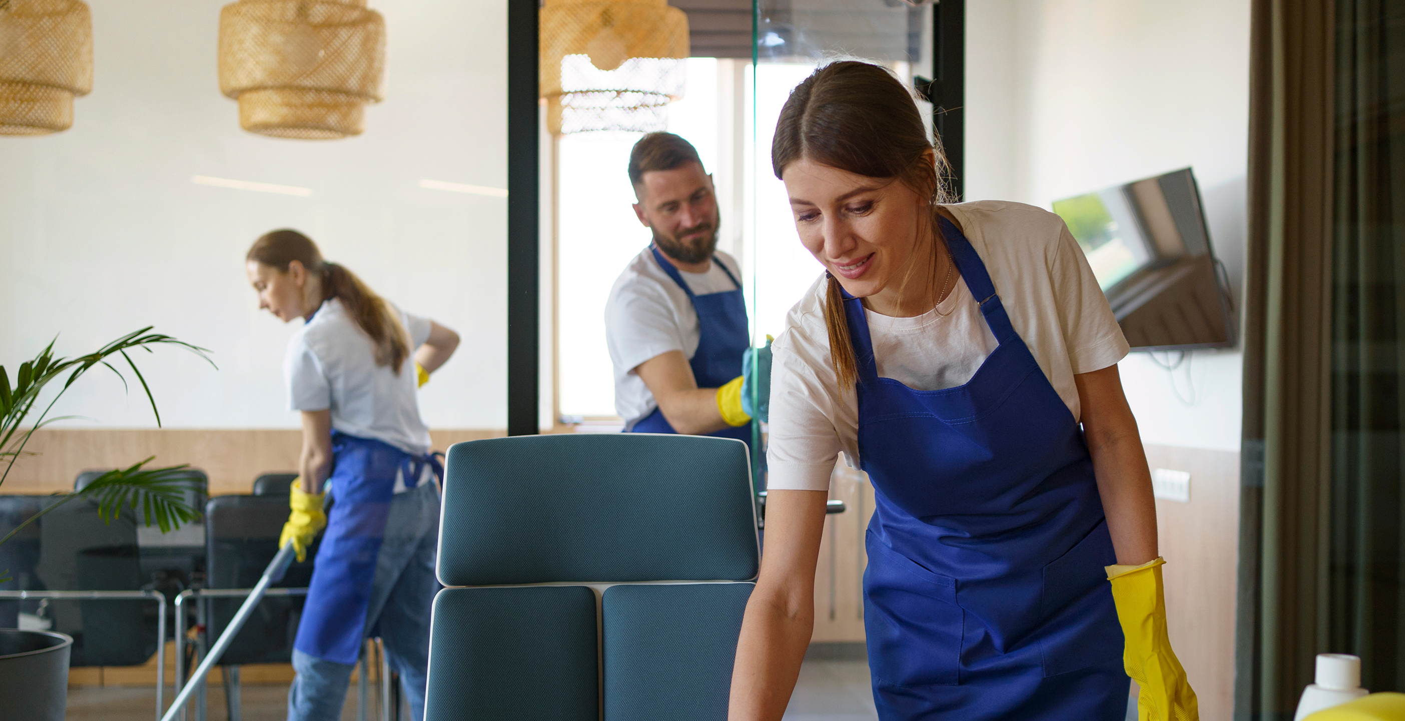 Professional cleaning team in office