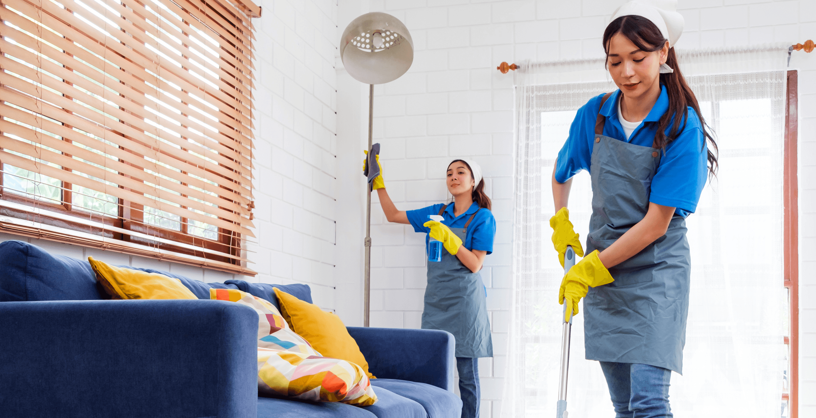 Professional cleaner dusting ceiling fan